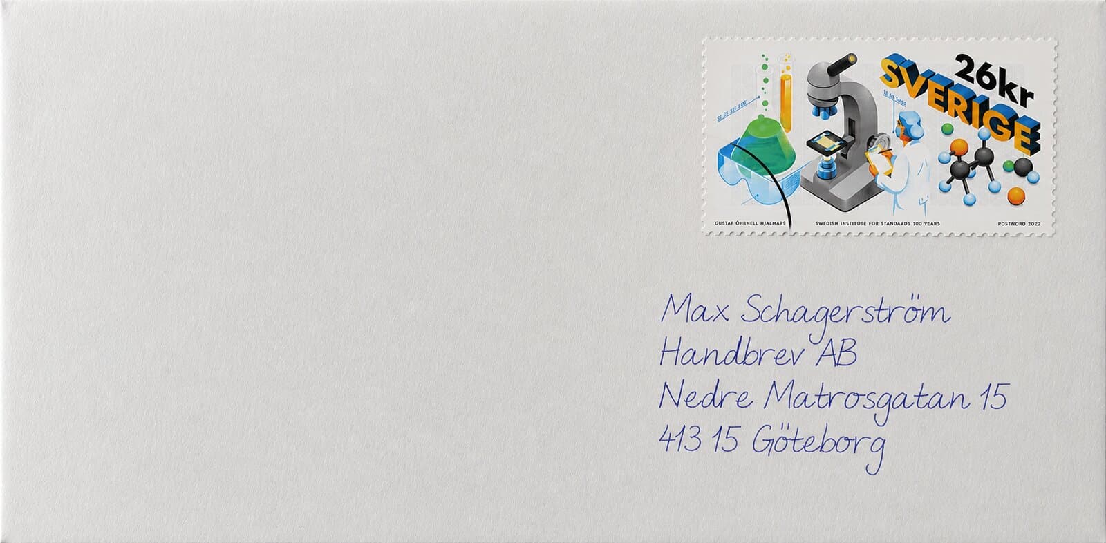 A stamped envelope with a handwritten address